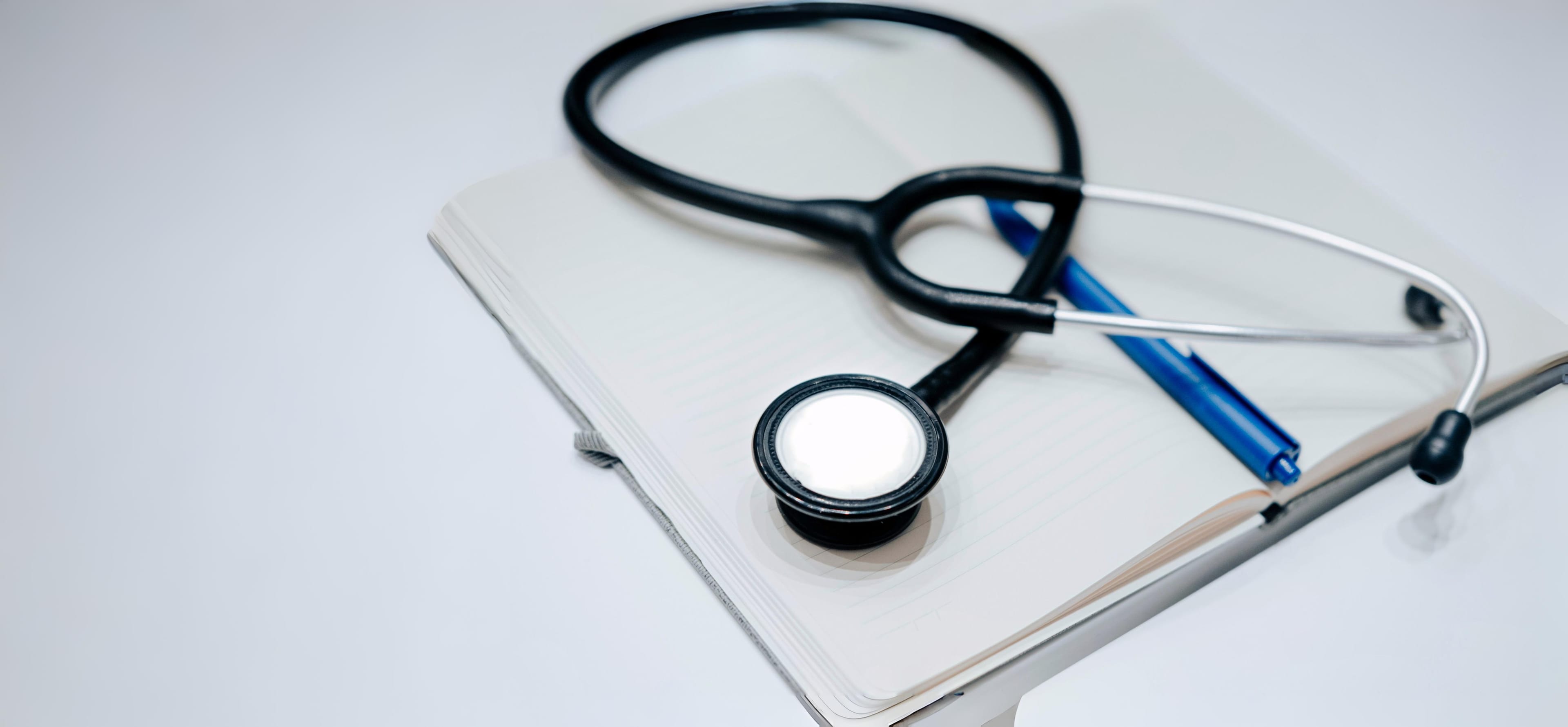 Stethoscope on notepad